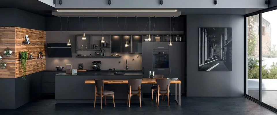 Dark modular kitchen with a wooden dining island and pendant lights